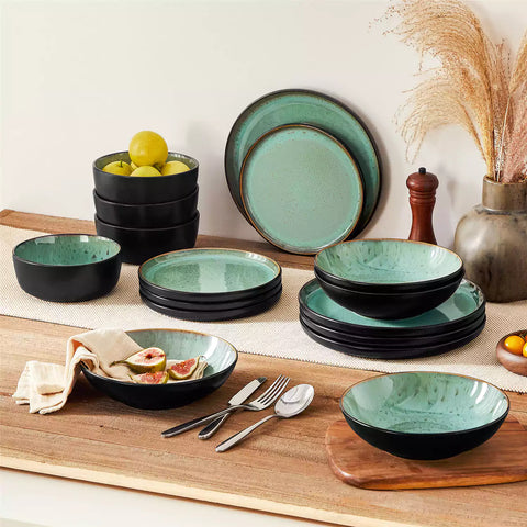 Assorted dishes with soup - dessert -  and fruit salad on rustic wooden table - Amber 16-Piece green stoneware dinnerware set with plates and bowls by vancasso