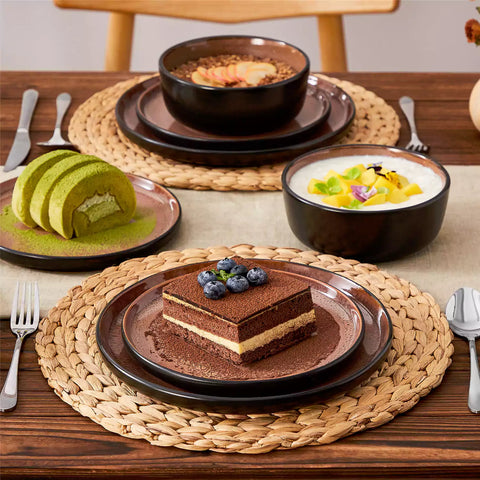 Rustic dining table with Amber 12-piece stoneware dinnerware in farmhouse red - featuring reactive glaze plates - bowls - and utensils by vancasso