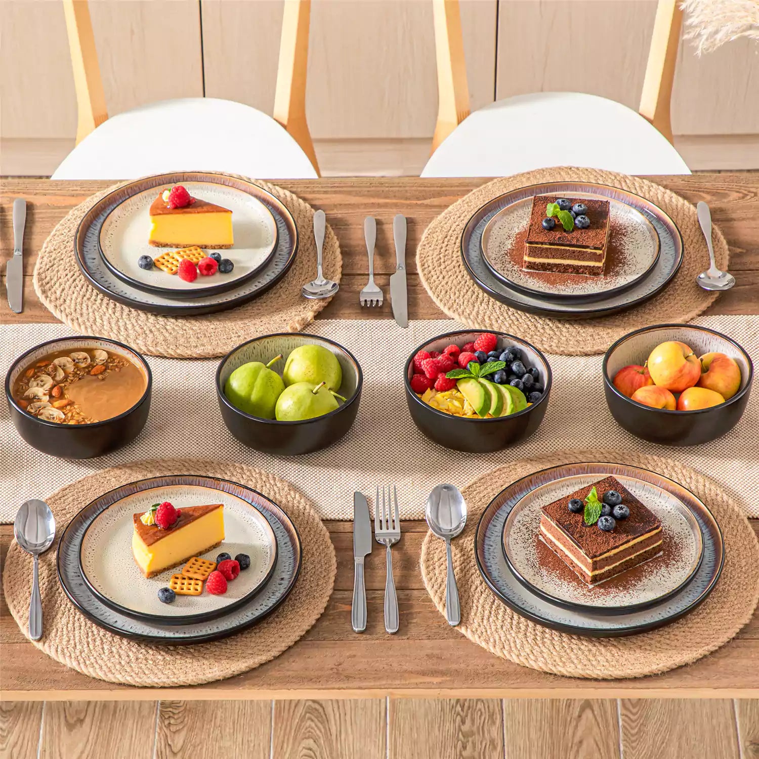 Rustic dining table with Amber 12-piece stoneware dinnerware in farmhouse beige - featuring reactive glaze plates - bowls - and utensils by vancasso
