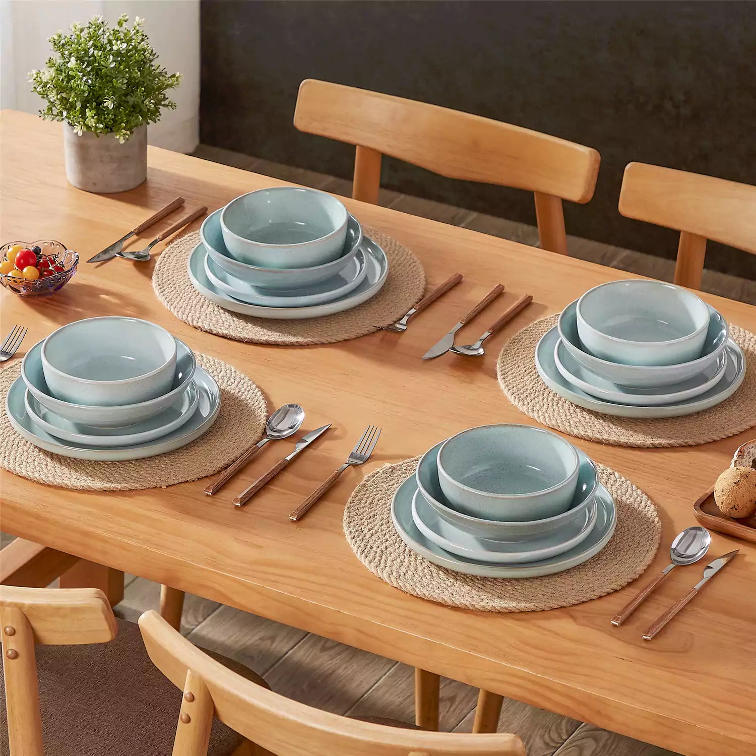 Handcrafted mint green stoneware with reactive glaze on woven placemats - perfect for farmhouse tables