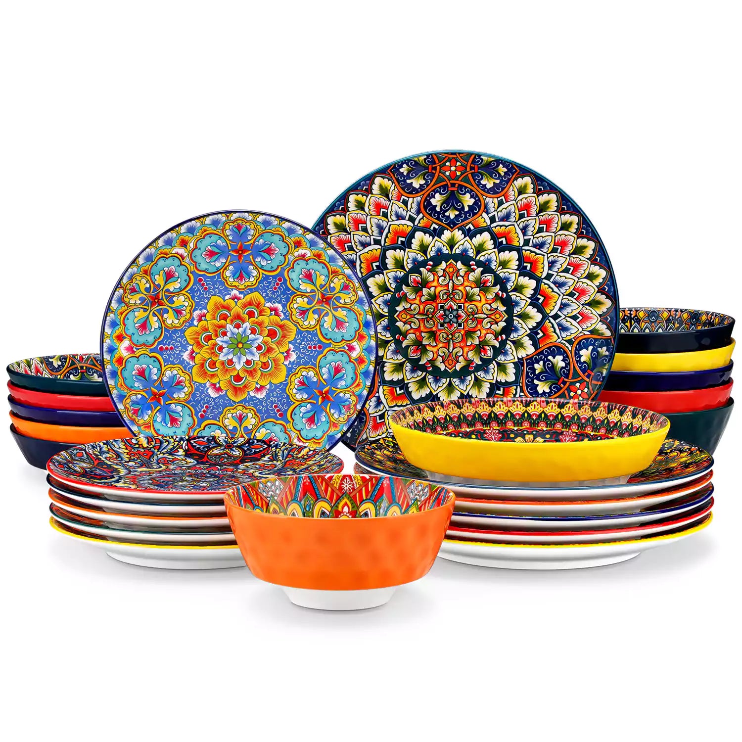 Lumi 24 piece porcelain dinnerware set with vibrant patterns stacked on a wooden table with colorful placemats and assorted dishes