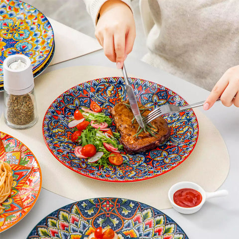 Lumi 6-piece 10.5'' Bohemian dinner plates with colorful mandala patterns on a white table with fruit and cutlery