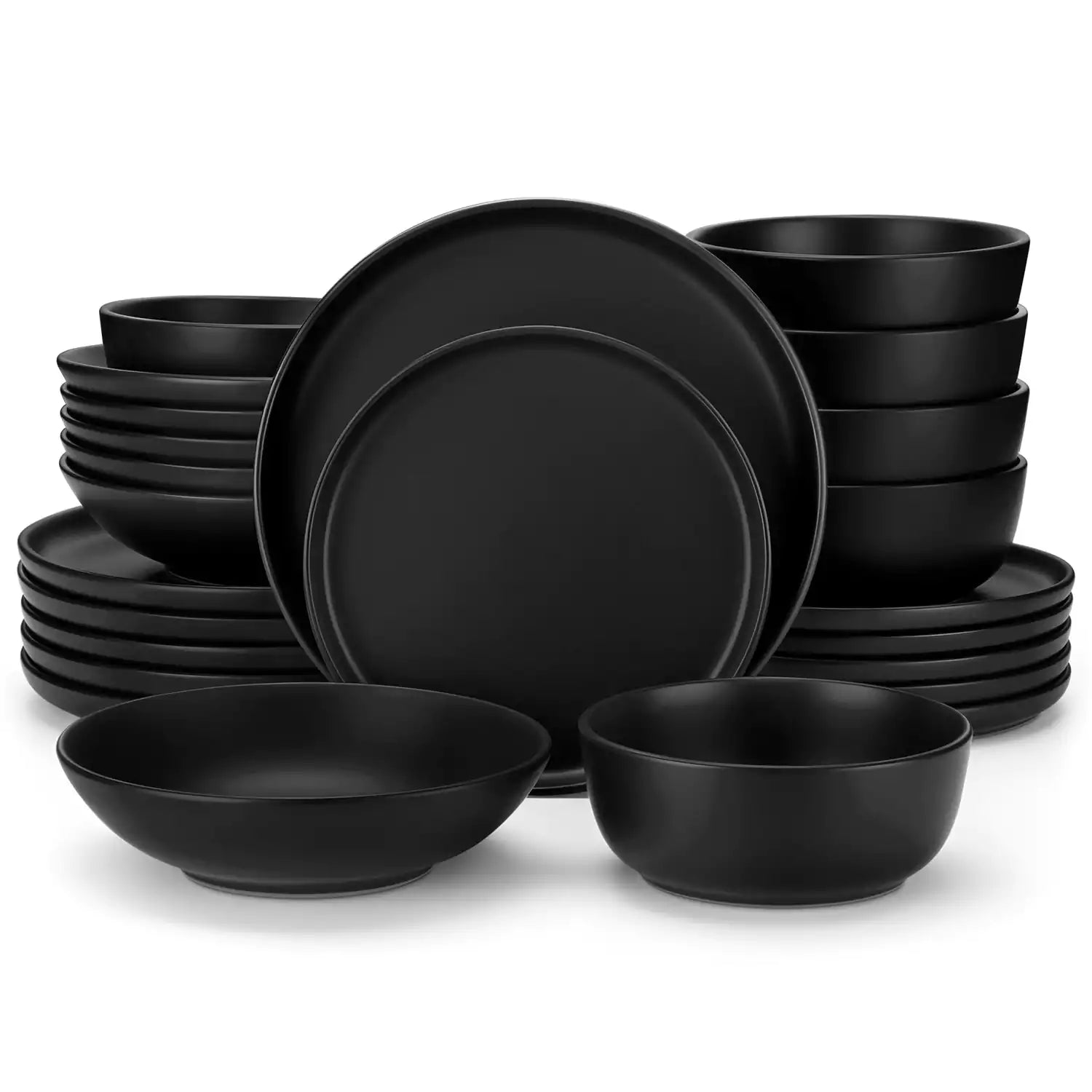 A matte black 24-piece stoneware dinnerware set from the Playa collection by vancasso - adding a modern flair with plates and bowls for 6 people