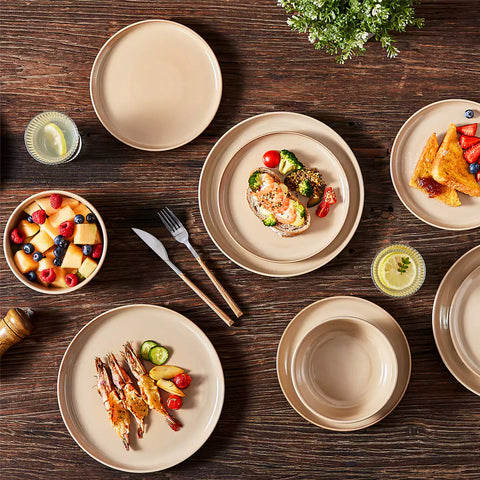 A glossy caramel 24-piece stoneware dinnerware set from the Playa collection - featuring farmhouse charm with plates and bowls for 6 people-vancasso