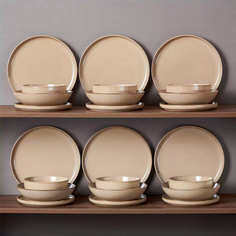 A glossy caramel 24-piece stoneware dinnerware set from the Playa collection - featuring farmhouse charm with plates and bowls for 6 people-vancasso