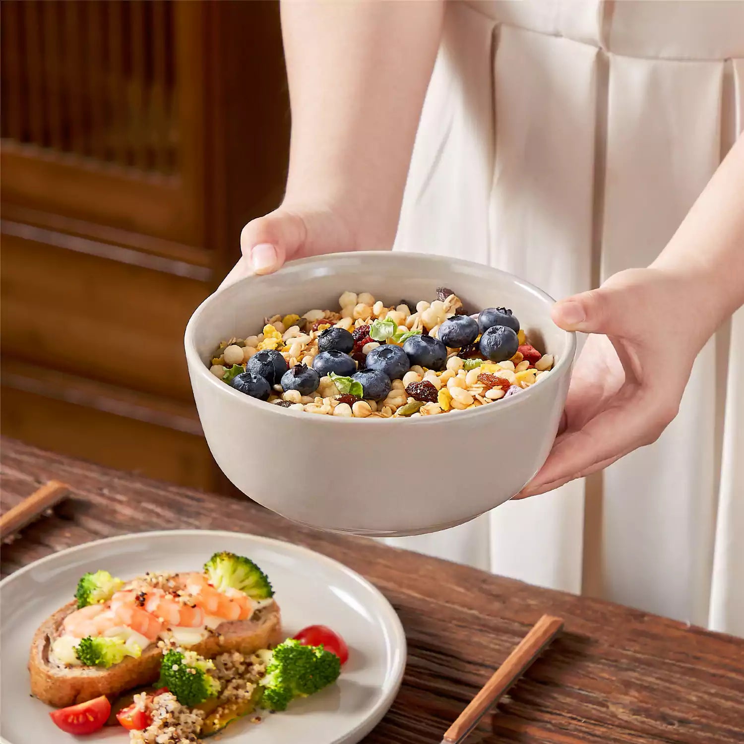 A glossy grey 16-piece stoneware dinnerware set from the Playa collection - featuring farmhouse charm with plates and bowls for 4 people-vancasso