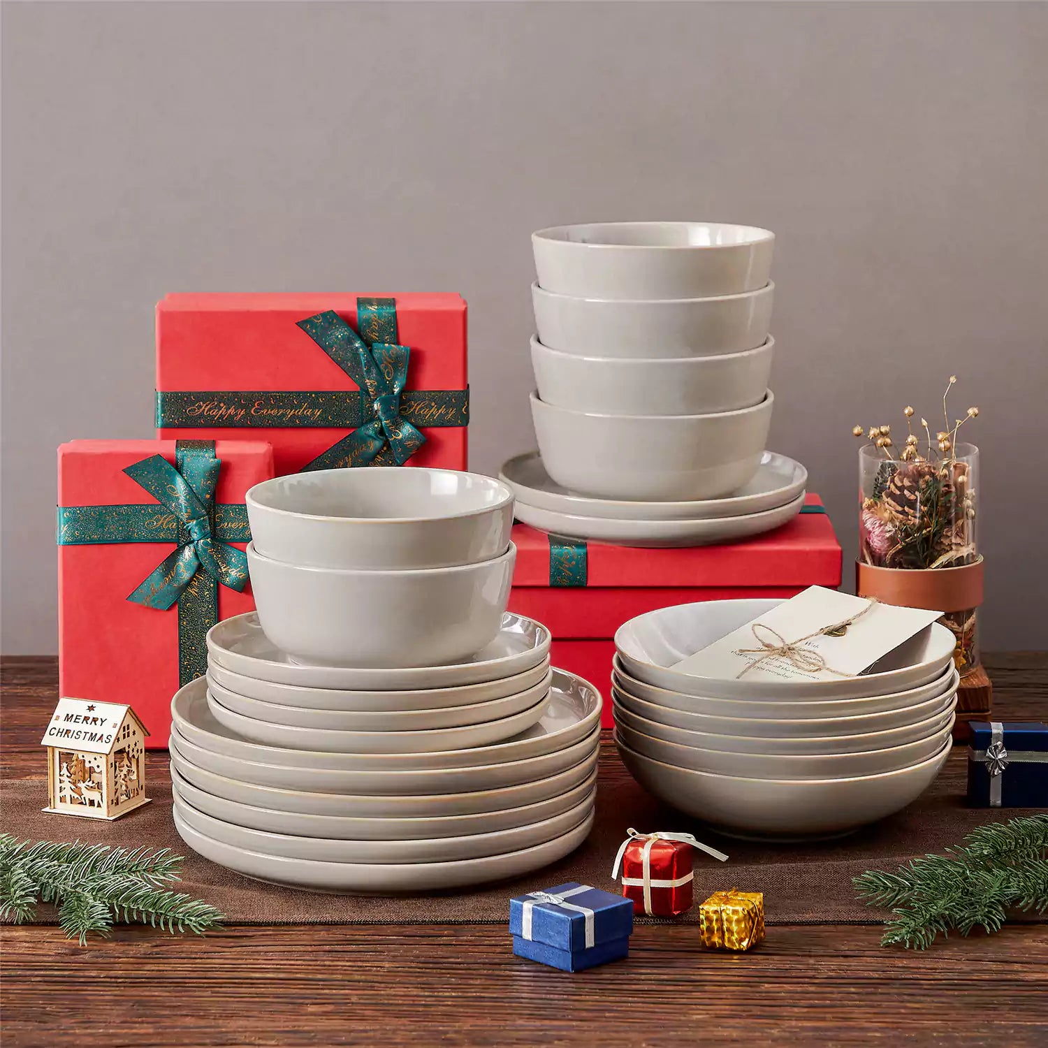 A glossy grey 24-piece stoneware dinnerware set from the Playa collection - featuring farmhouse charm with plates and bowls for 6 people-vancasso