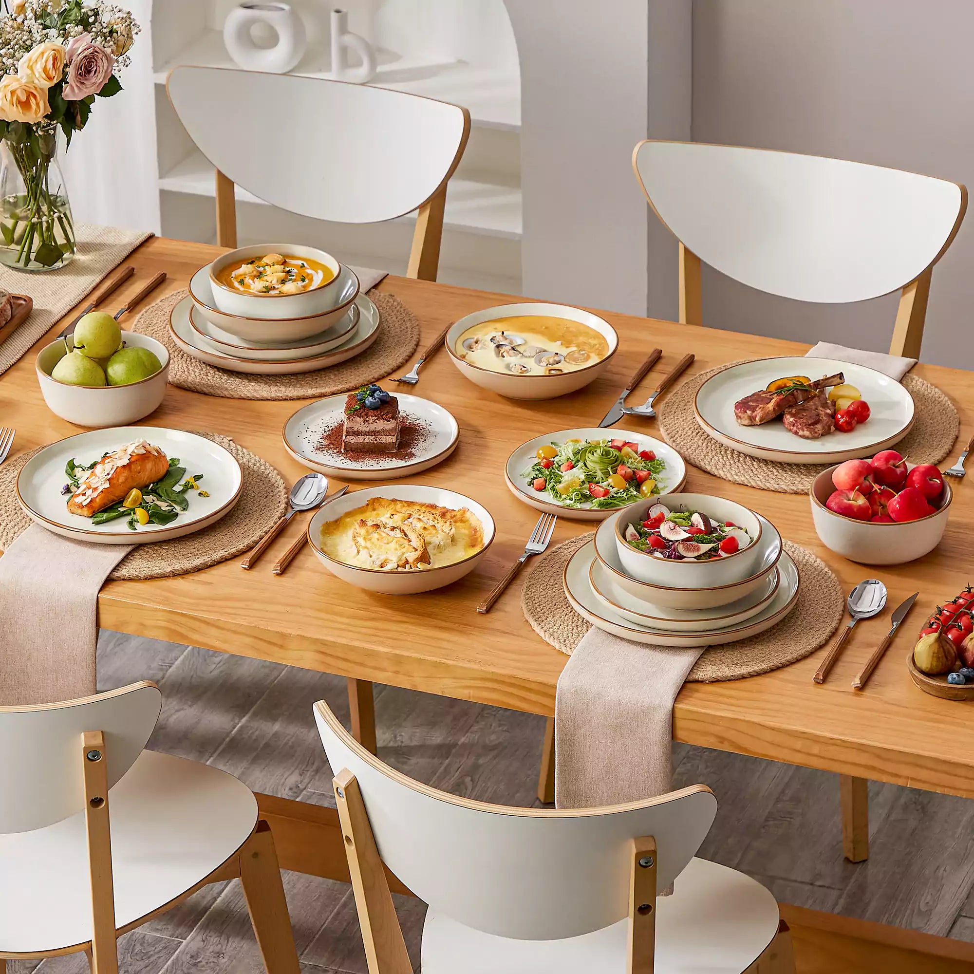 Rustic beige speckled stoneware dinnerware set with lipped-edge plates and bowls arranged on a sunlit modern dining table-vancasso