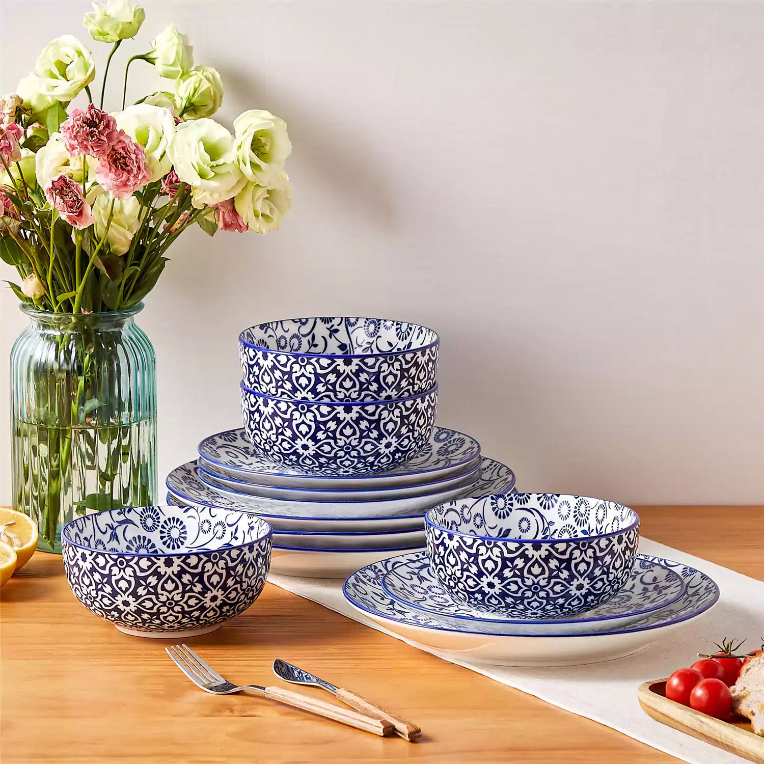 Selene 12-Piece Porcelain Dinnerware Set with blue and white Sol pattern and Japanese-inspired design - including matching plates and bowls-vancasso