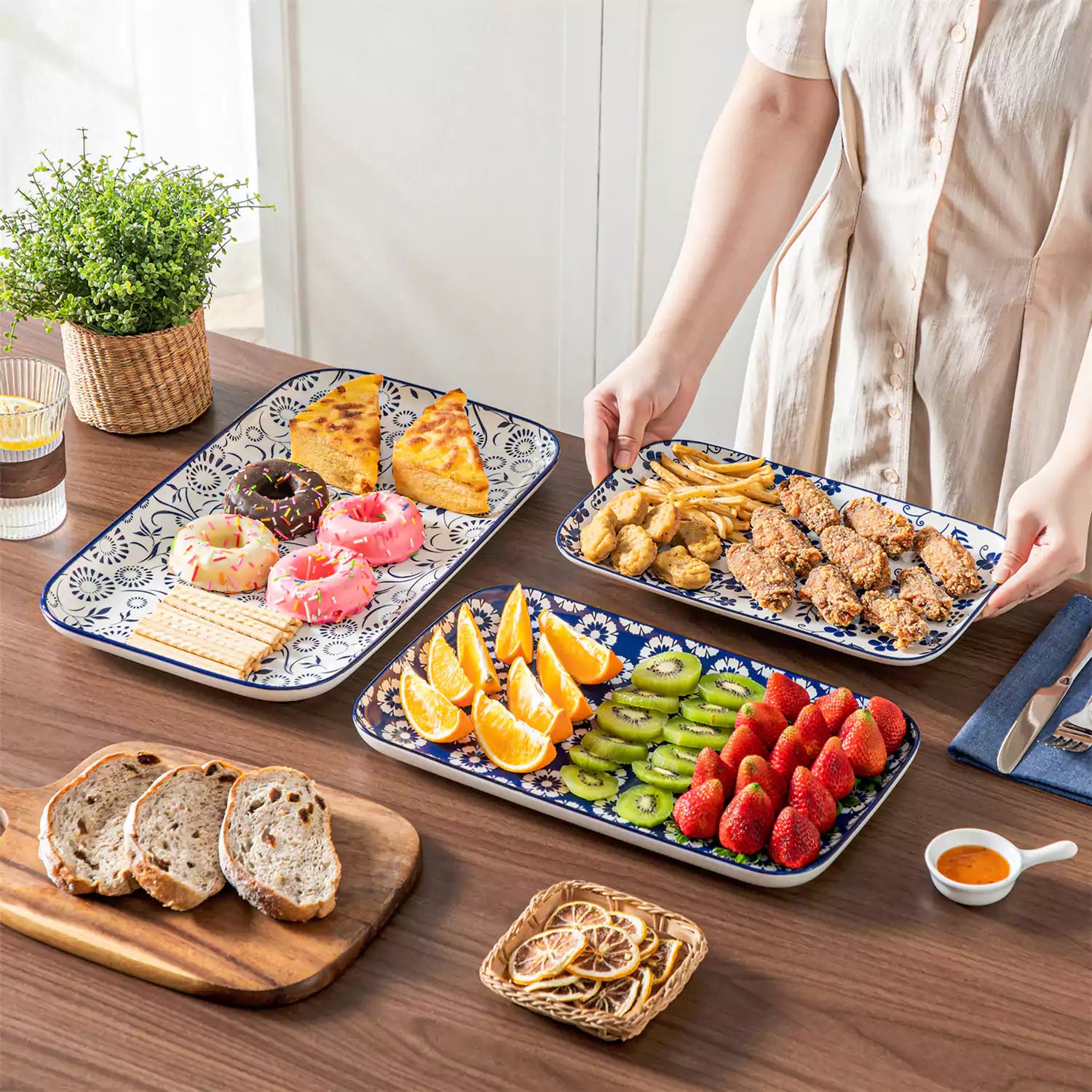 Selene serving platters Set B on dining table with assorted appetizers - fresh fruits - and pastries for elegant entertaining