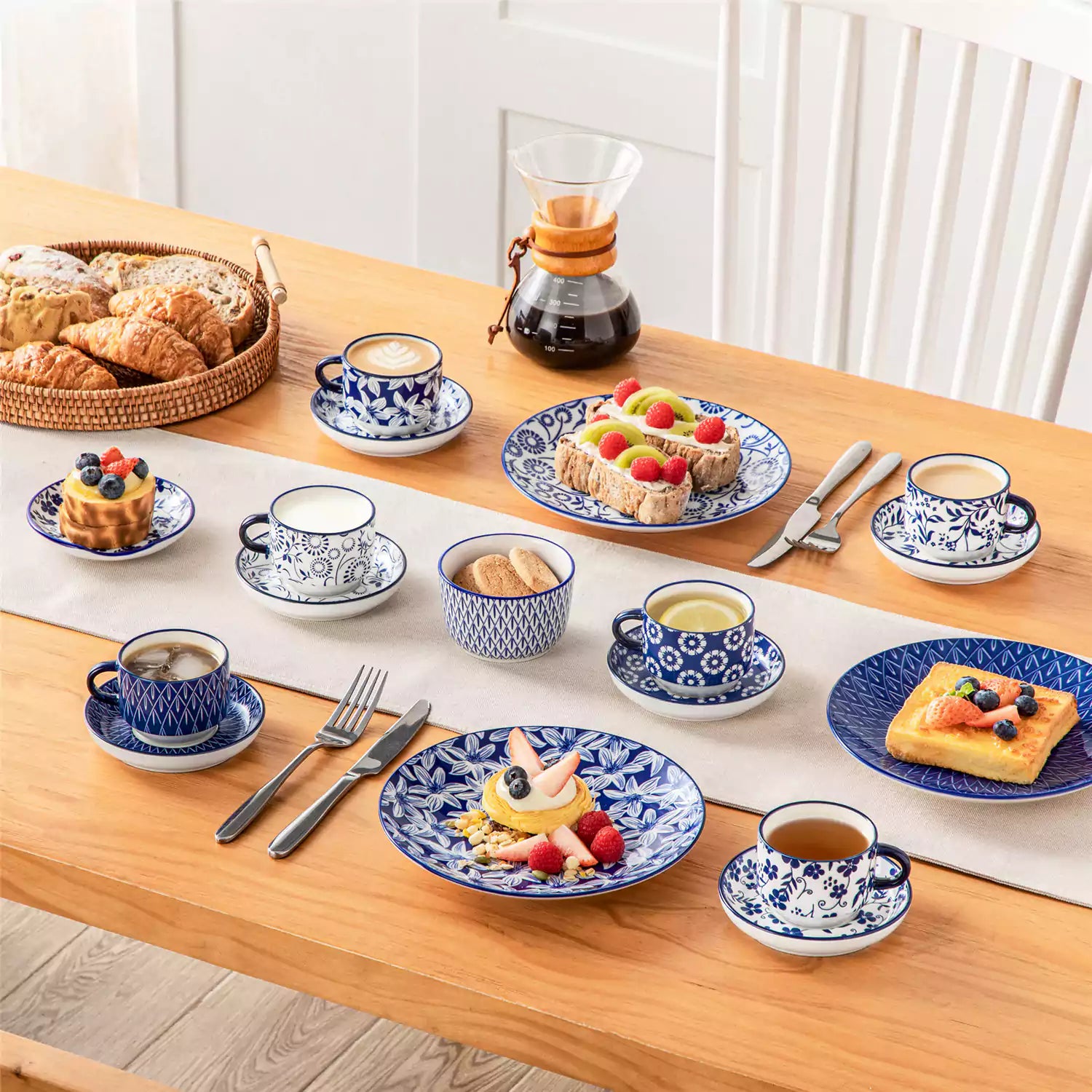 Stackable Selene 5oz blue and white indigo pattern porcelain espresso cups and saucers with a minimalist metal organizer