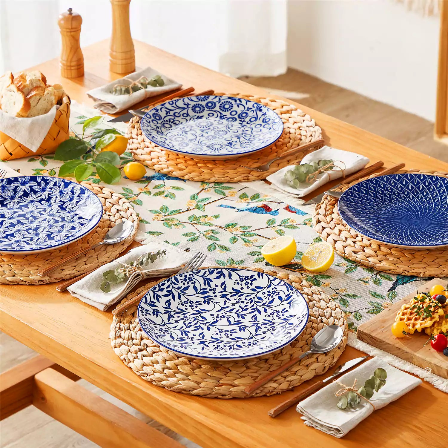 Selene porcelain dinner plates set of 4 styled with pizza and bread on woven placemat mix and match Japanese inspired table setting