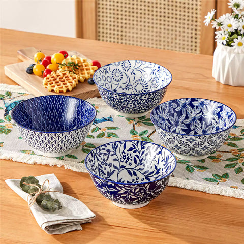 Selene porcelain cereal bowls set of 4 blue and white Japanese inspired floral pattern mix and match tableware styled with fruits and dishes on dining table