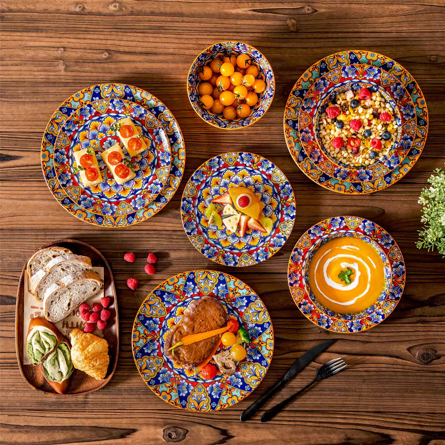Bohemian-style 12-piece porcelain dinnerware set with front-only floral and geometric patterns in bold orange - modern and artistic table setting