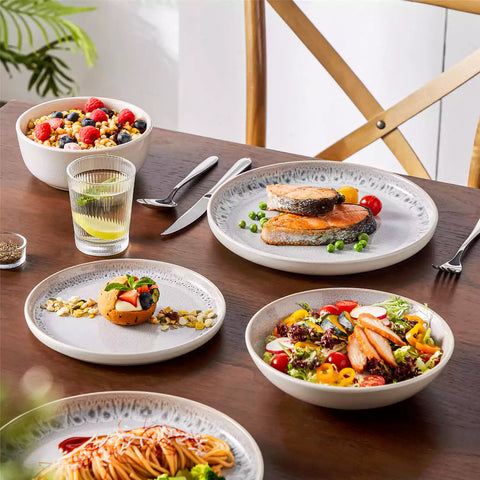 Snow 16-Piece Stoneware Set With Snowflake Glaze Perfect For Cozy Everyday Meals.