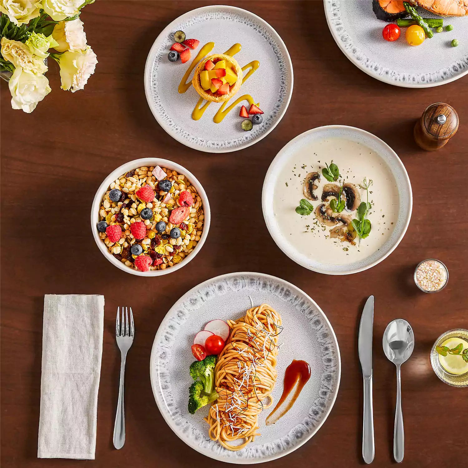 Snow 16-Piece Stoneware Set With Snowflake Glaze Perfect For Cozy Everyday Meals.