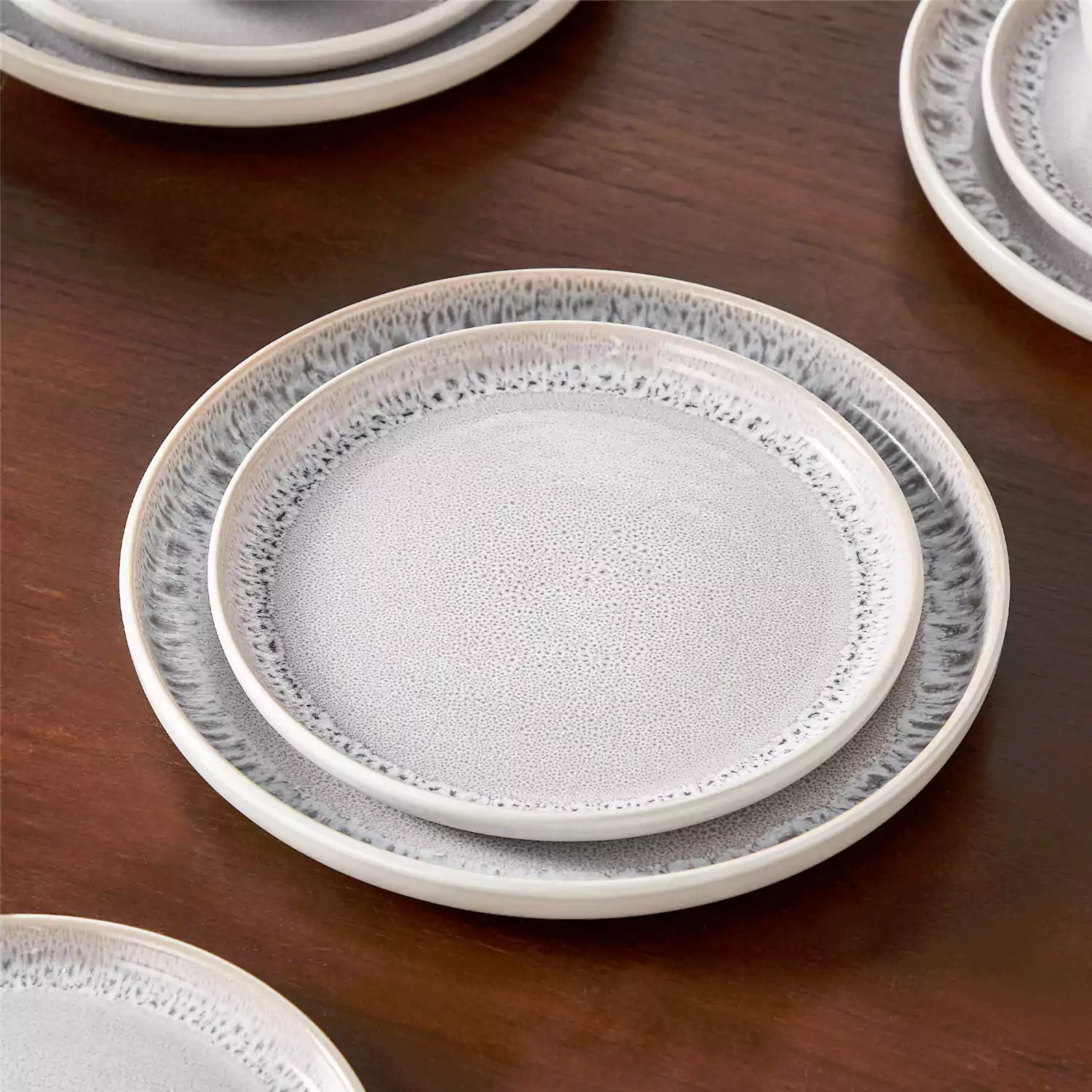 Snow 16-Piece Stoneware Set With Snowflake Glaze Perfect For Cozy Everyday Meals.