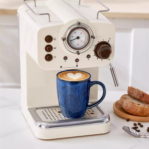 Blue Starry 12oz stoneware mugs set of 4 with reactive glaze finish on a kitchen counter with coffee milk and fresh bread